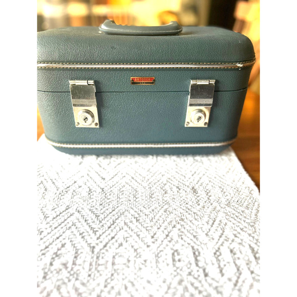 Antosek over night case with lock and key.